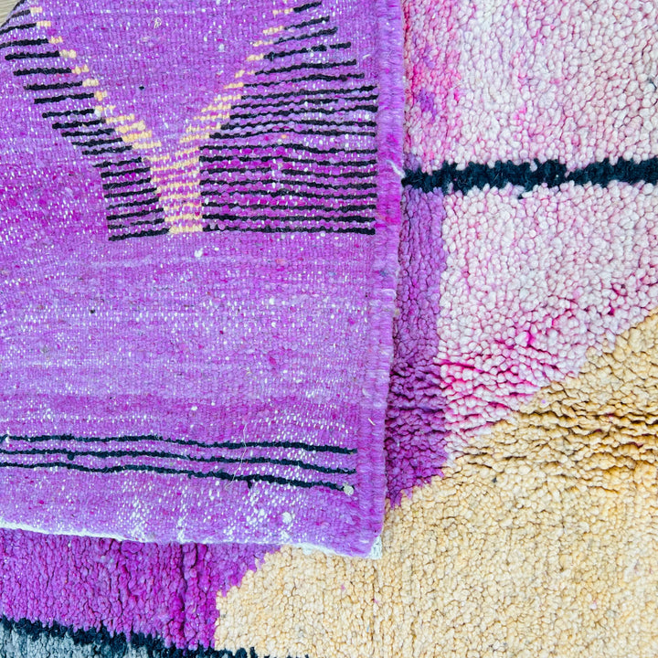 Vintage Moroccan rug 663 with pink, orange, and ivory abstract lines, handmade in wool.

