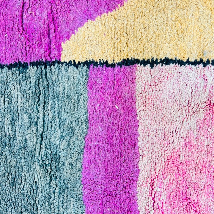 Vintage Moroccan rug 663 with pink, orange, and ivory abstract lines, handmade in wool.

