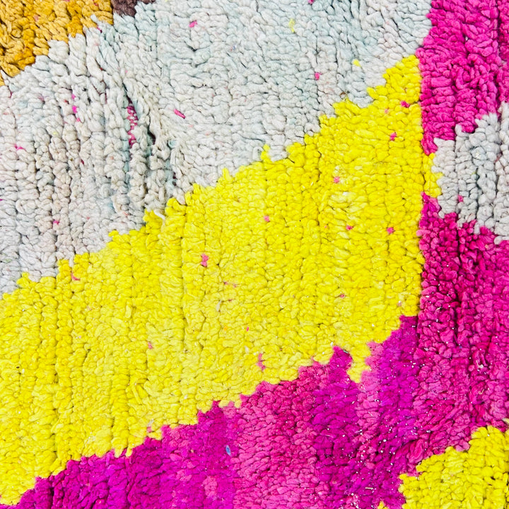 Vintage Moroccan wool rug in bold pink, yellow, and blue zig-zag pattern – handmade 244x150 cm

