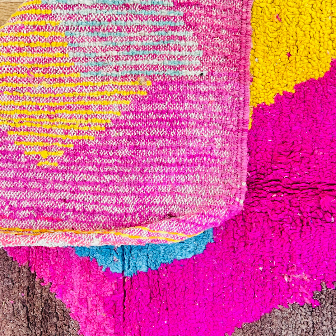 Vintage Moroccan wool rug in bold pink, yellow, and blue zig-zag pattern – handmade 244x150 cm

