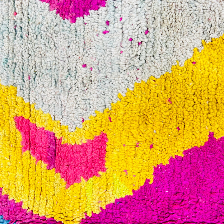 Vintage Moroccan wool rug in bold pink, yellow, and blue zig-zag pattern – handmade 244x150 cm

