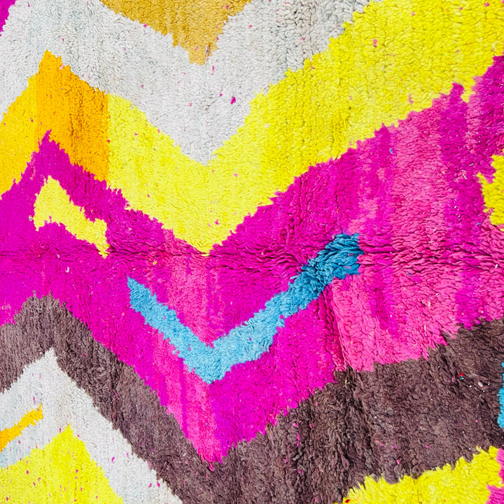 Vintage Moroccan wool rug in bold pink, yellow, and blue zig-zag pattern – handmade 244x150 cm

