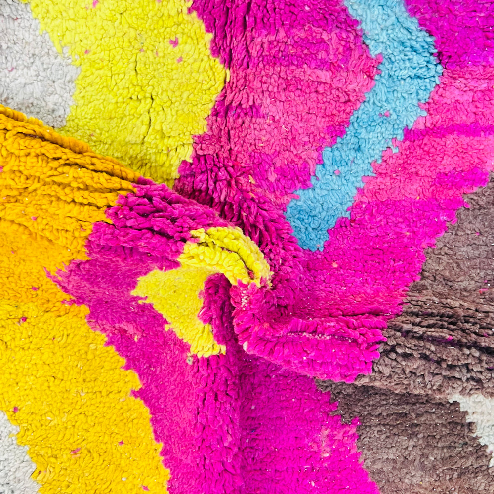 Vintage Moroccan wool rug in bold pink, yellow, and blue zig-zag pattern – handmade 244x150 cm

