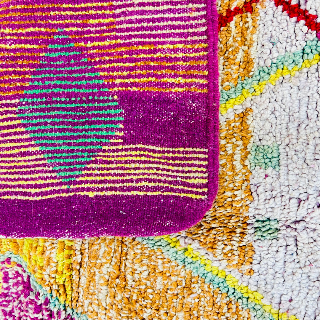 Vintage Moroccan rug No. 653 with colorful geometric Berber motifs in yellow, green, and red wool

