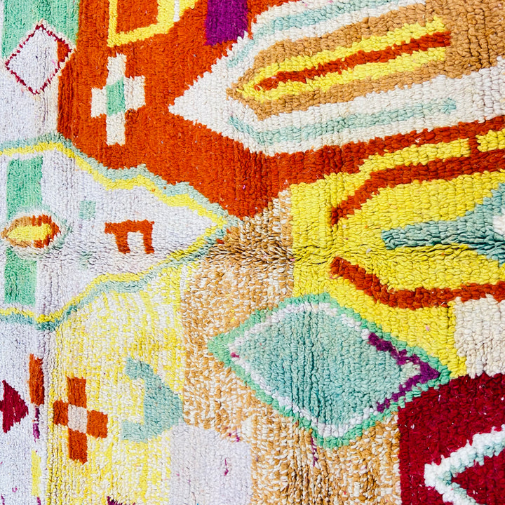 Vintage Moroccan rug No. 653 with colorful geometric Berber motifs in yellow, green, and red wool

