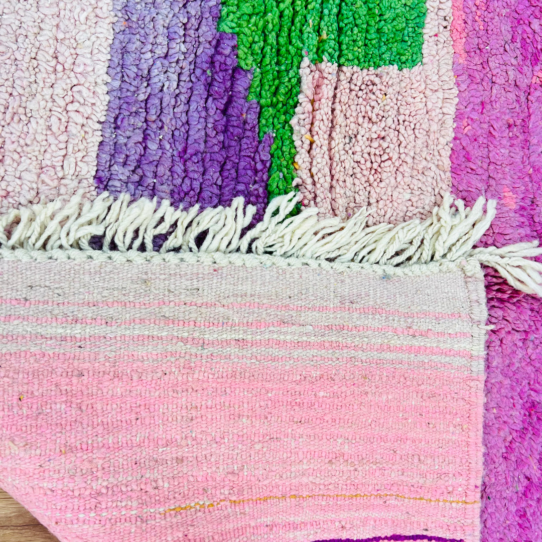 Vintage Moroccan wool rug 610 with colorful modern abstract design in pink, blue, green, and cream

