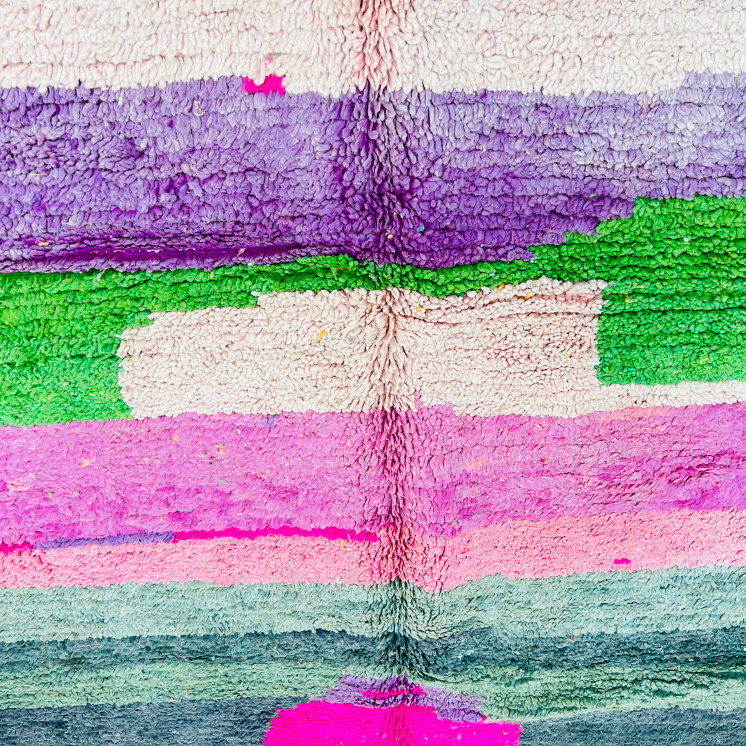 Vintage Moroccan wool rug 610 with colorful modern abstract design in pink, blue, green, and cream

