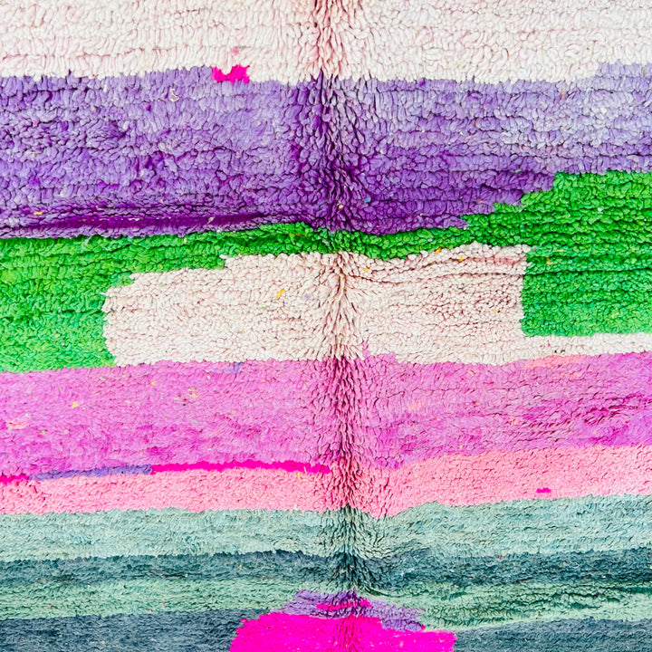 Vintage Moroccan wool rug 610 with colorful modern abstract design in pink, blue, green, and cream

