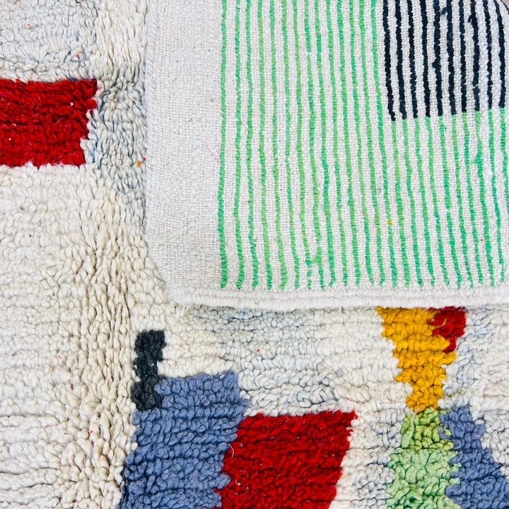 Vintage Moroccan rug No. 676 with colorful abstract pattern and shaggy wool texture

