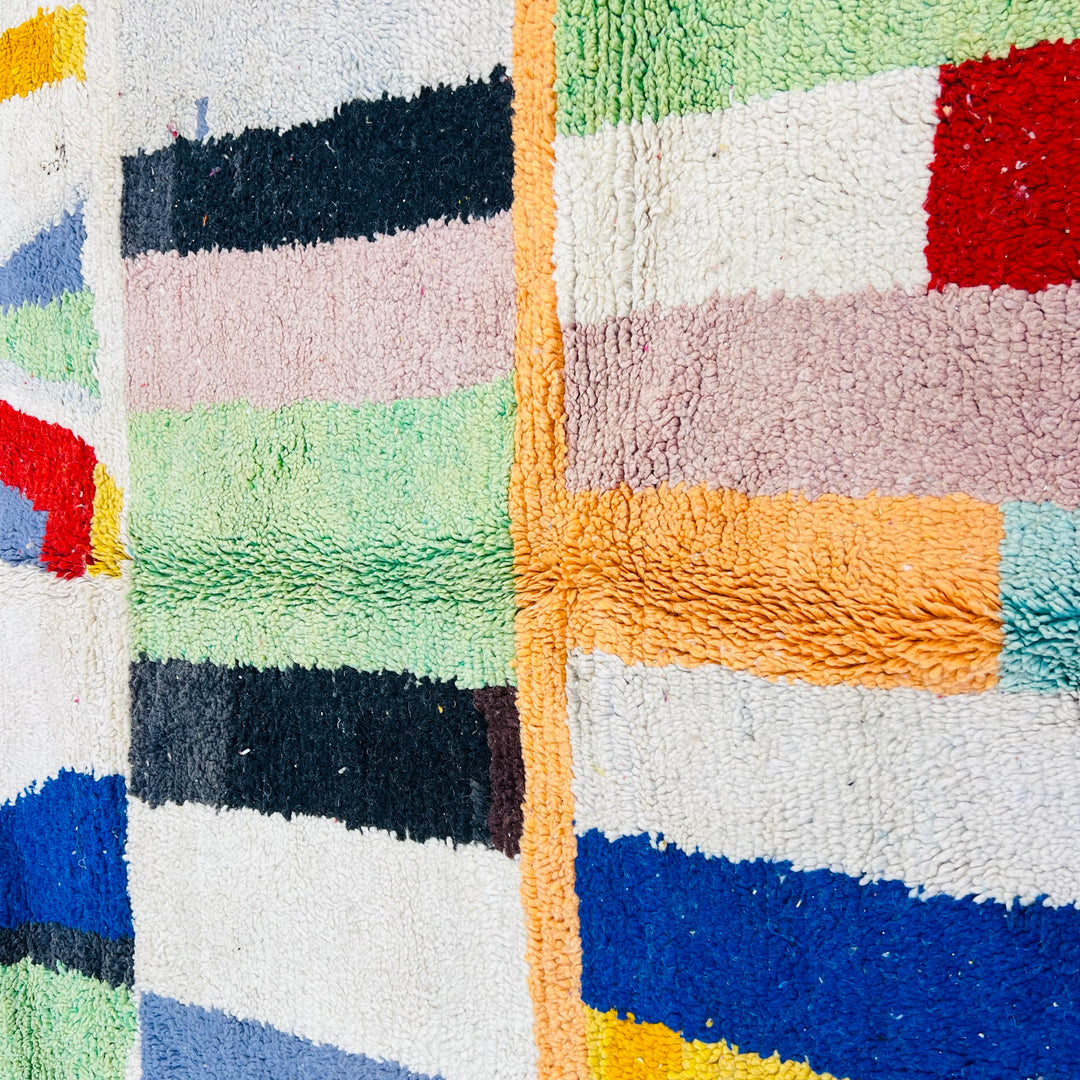 Vintage Moroccan rug No. 676 with colorful abstract pattern and shaggy wool texture

