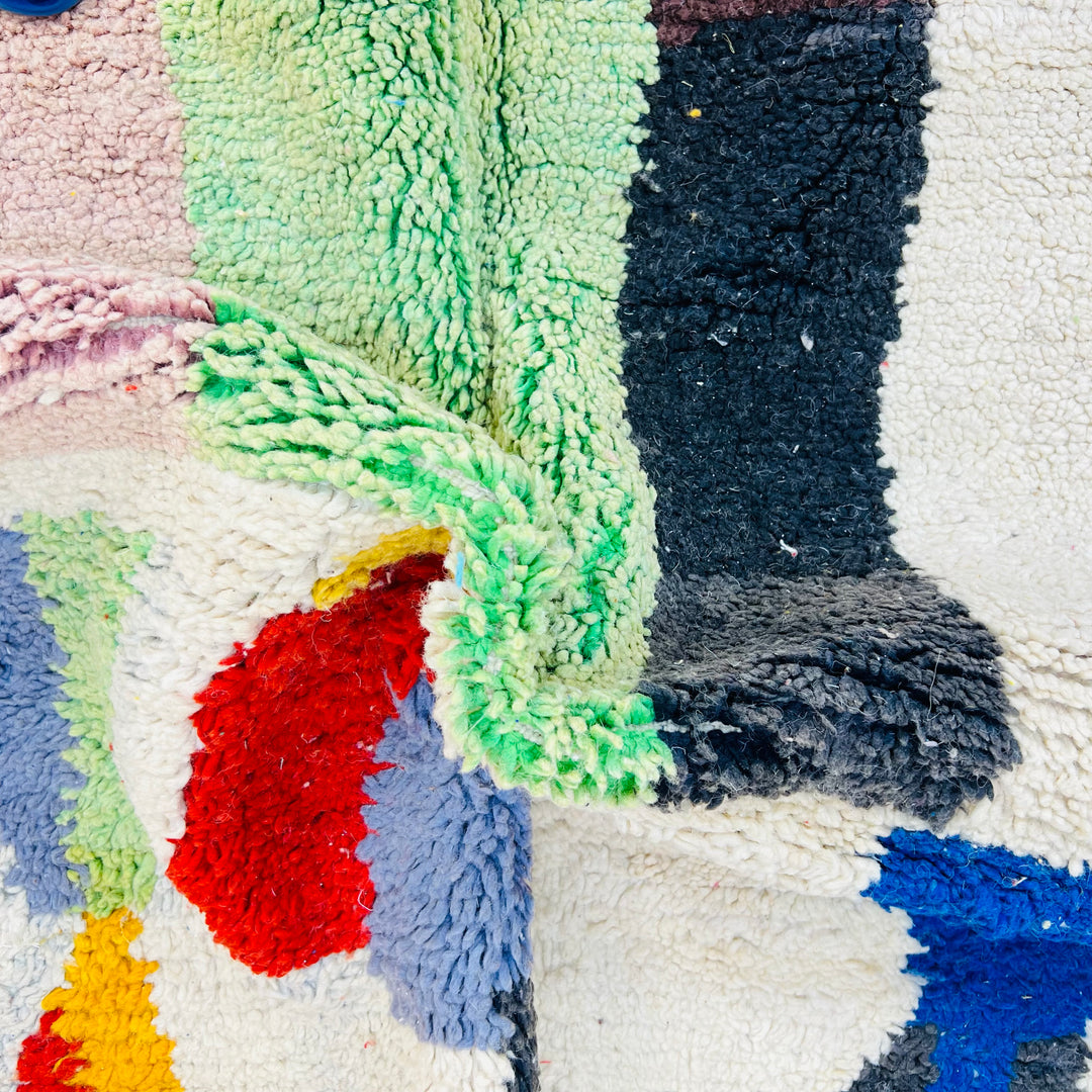 Vintage Moroccan rug No. 676 with colorful abstract pattern and shaggy wool texture

