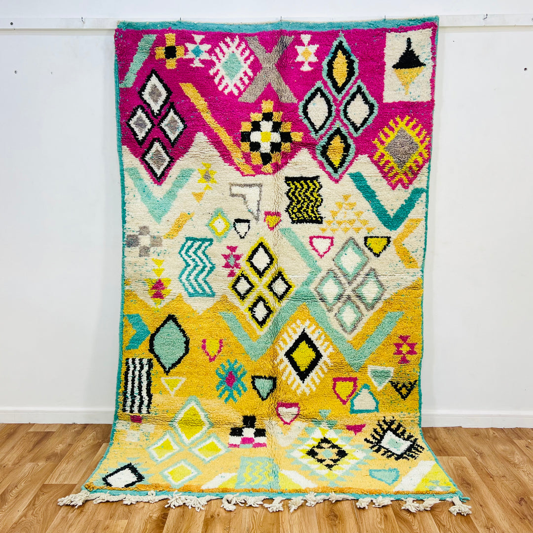 Colorful vintage Moroccan wool rug with yellow, pink, and black Amazigh symbols – Rug 698

