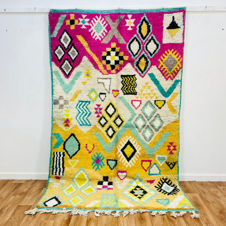 Colorful vintage Moroccan wool rug with yellow, pink, and black Amazigh symbols – Rug 698

