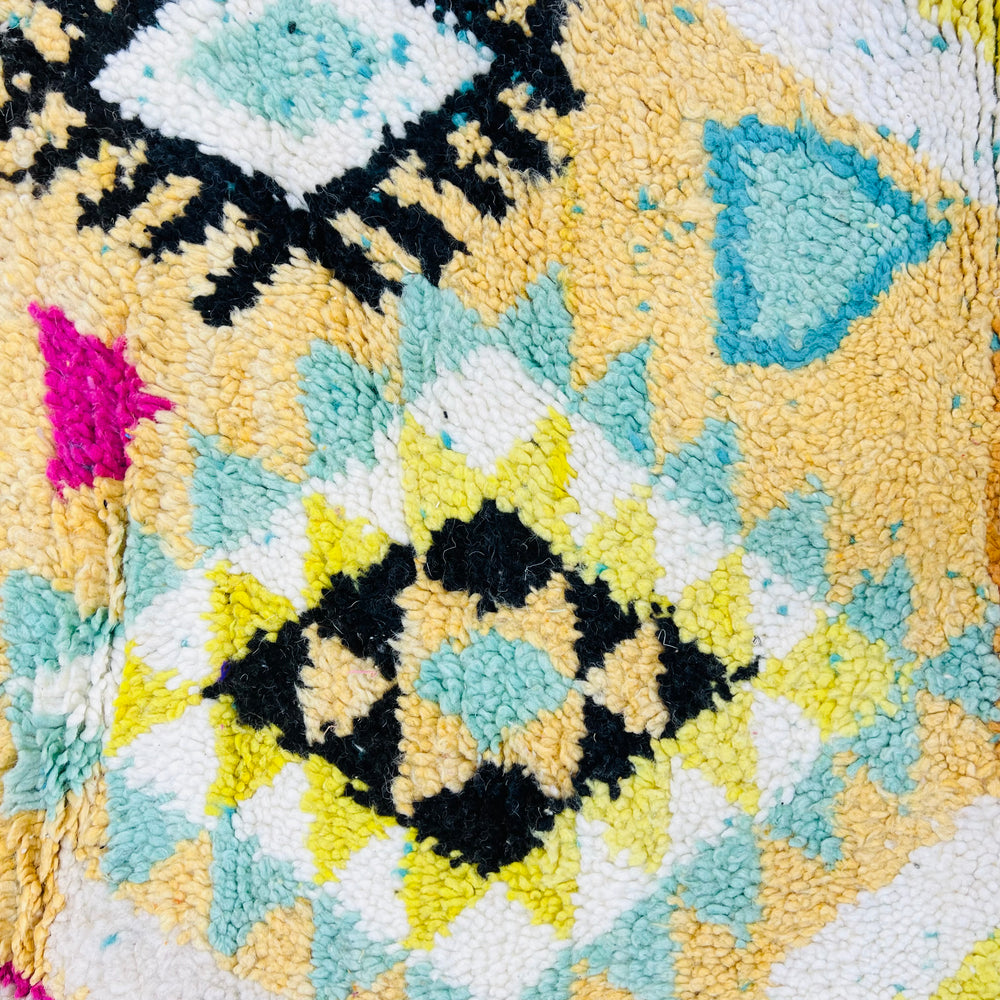 Colorful vintage Moroccan wool rug with yellow, pink, and black Amazigh symbols – Rug 698

