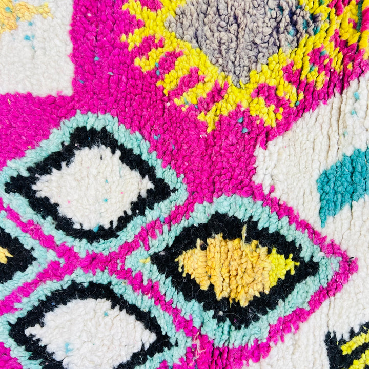 Colorful vintage Moroccan wool rug with yellow, pink, and black Amazigh symbols – Rug 698

