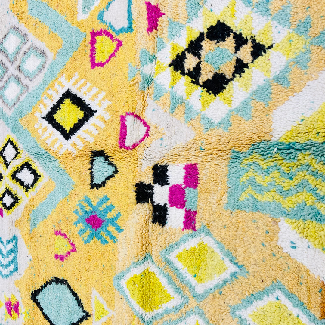 Colorful vintage Moroccan wool rug with yellow, pink, and black Amazigh symbols – Rug 698

