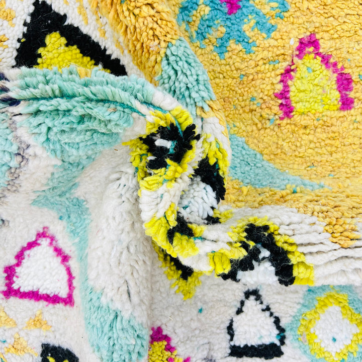 Colorful vintage Moroccan wool rug with yellow, pink, and black Amazigh symbols – Rug 698

