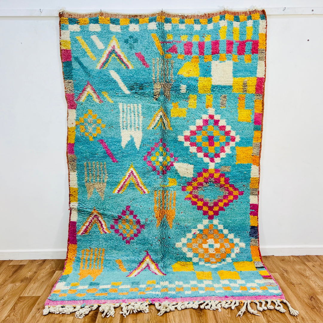 Vintage Moroccan wool rug with turquoise background and colorful Berber patterns – Rug 696

