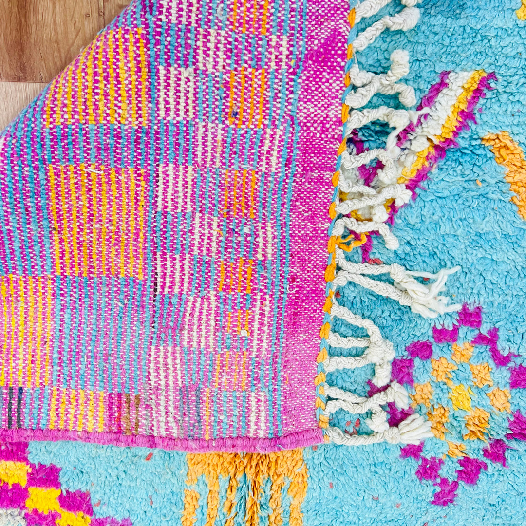 Vintage Moroccan wool rug with turquoise background and colorful Berber patterns – Rug 696

