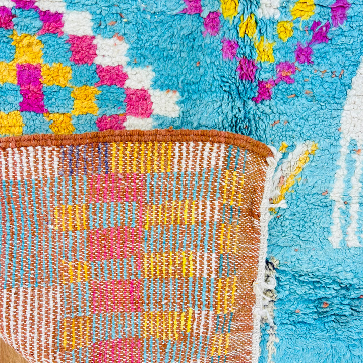 Vintage Moroccan wool rug with turquoise background and colorful Berber patterns – Rug 696

