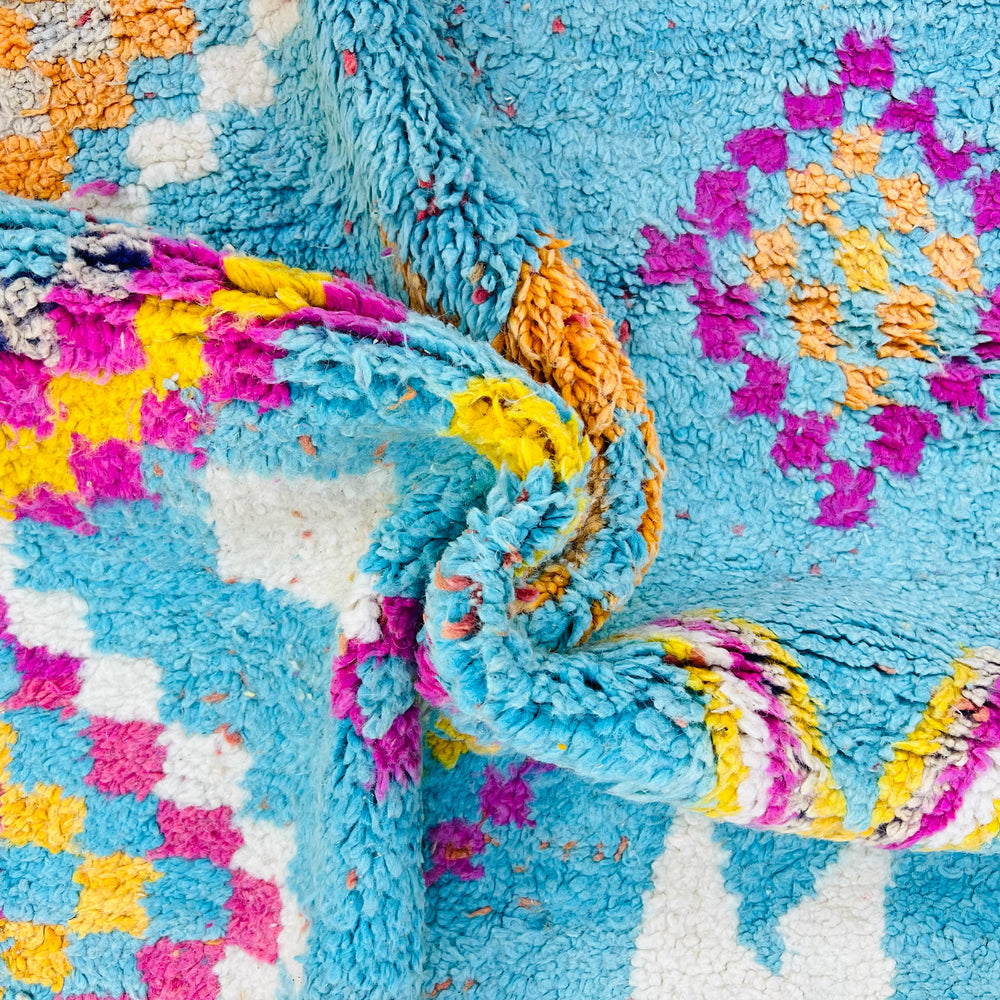Vintage Moroccan wool rug with turquoise background and colorful Berber patterns – Rug 696


