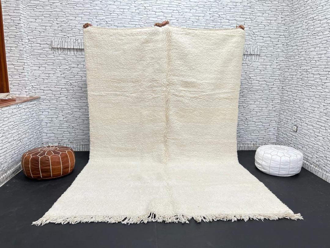 Ivory handmade Moroccan wool rug with plush soft texture and minimalist design