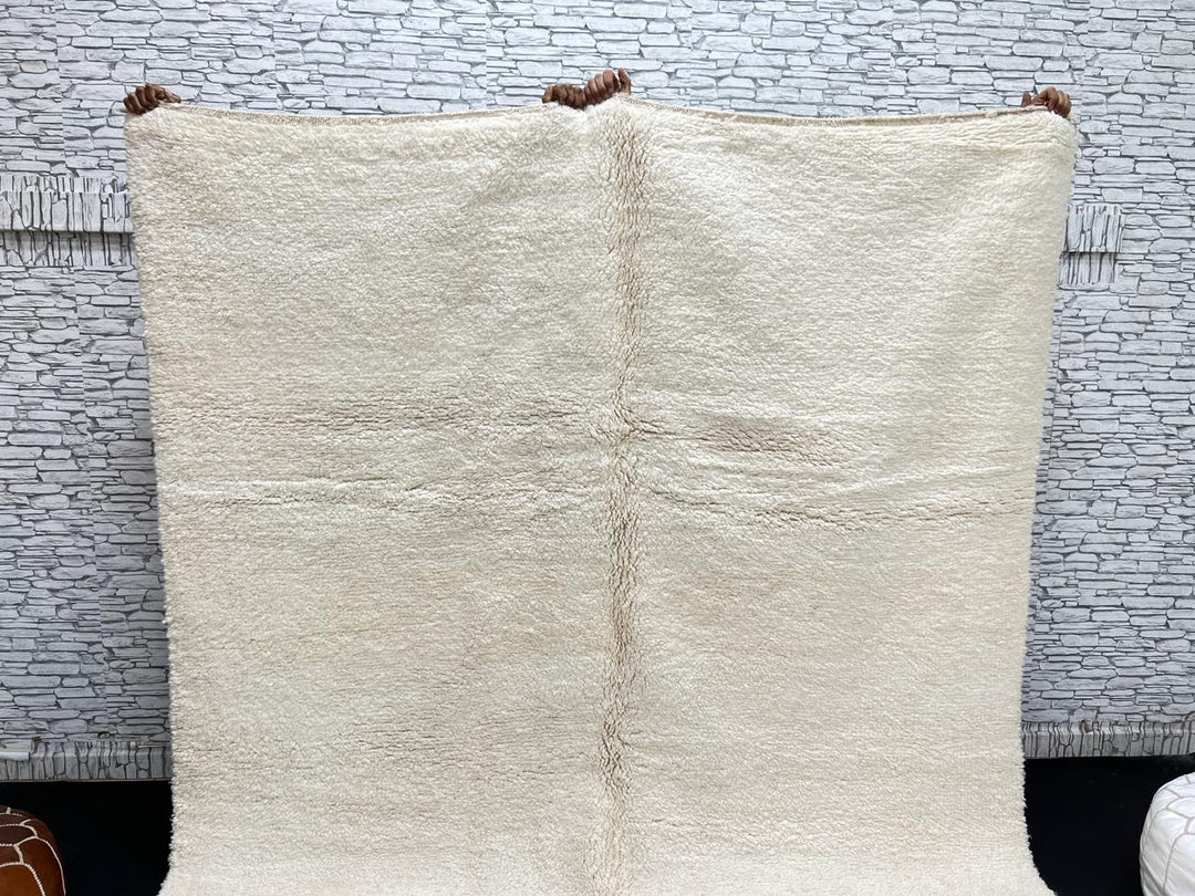 Ivory handmade Moroccan wool rug with plush soft texture and minimalist design
