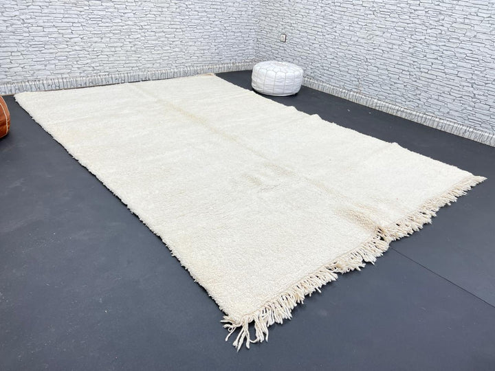 Ivory handmade Moroccan wool rug with plush soft texture and minimalist design