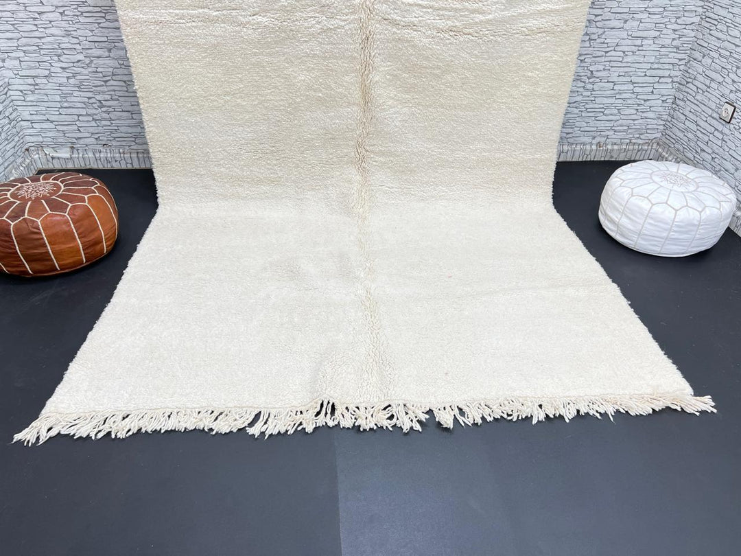 Ivory handmade Moroccan wool rug with plush soft texture and minimalist design