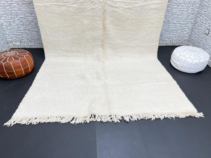 Ivory handmade Moroccan wool rug with plush soft texture and minimalist design