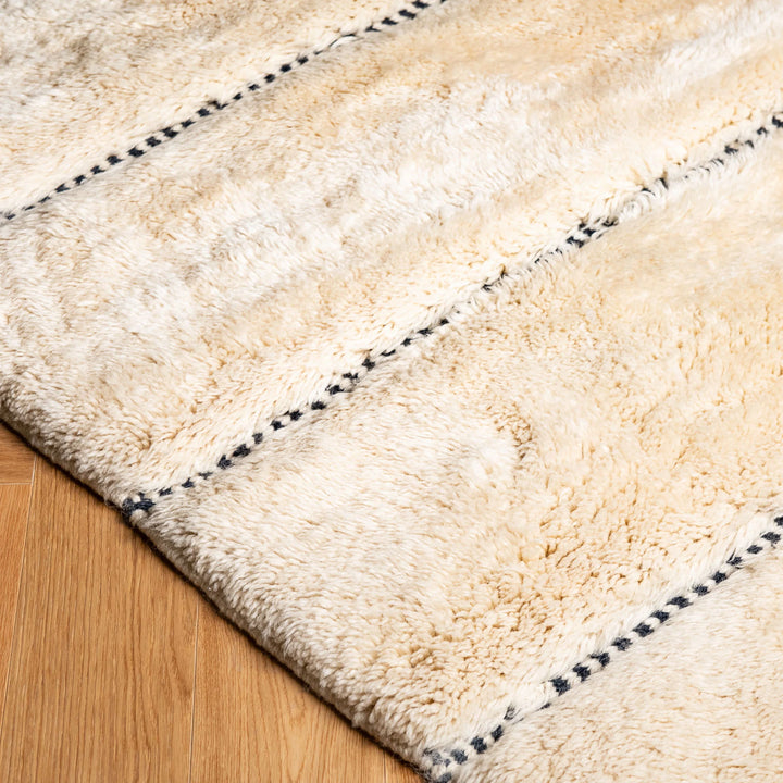 Ivory Moroccan Wool Rug with Subtle Horizontal Black Lines
