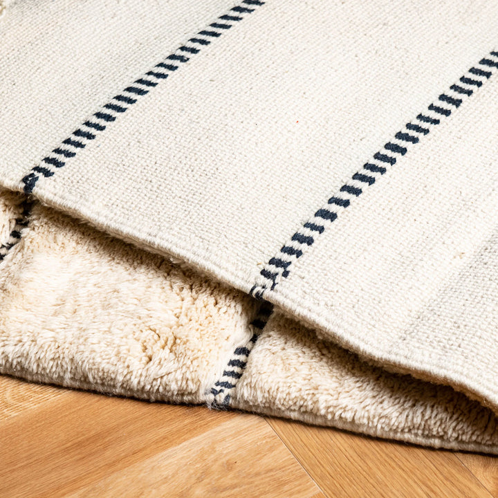Ivory Moroccan Wool Rug with Subtle Horizontal Black Lines