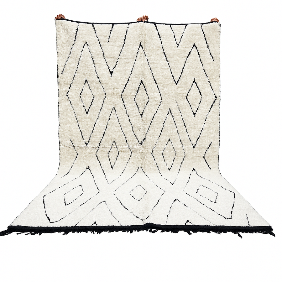 Ivory Moroccan wool rug with black diamond lattice handmade by Berber artisans