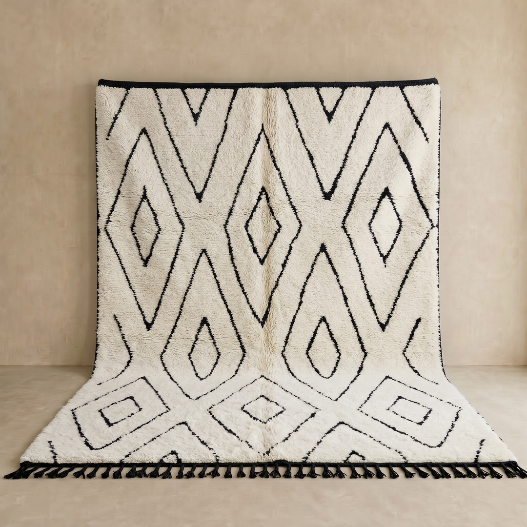 Ivory Moroccan wool rug with black diamond lattice handmade by Berber artisans