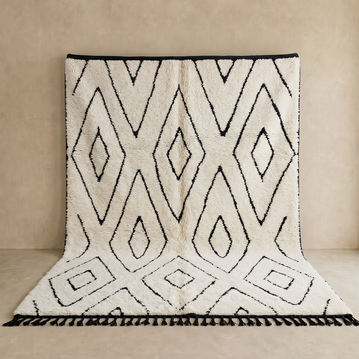 Ivory Moroccan wool rug with black diamond lattice handmade by Berber artisans