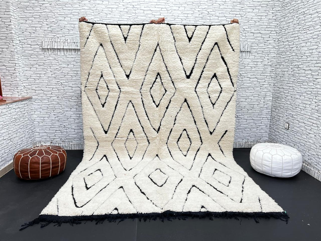 Ivory Moroccan wool rug with black diamond lattice handmade by Berber artisans