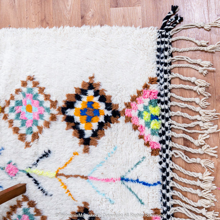Large Beni Ourain Moroccan rug with colorful diamond motifs on white wool background – handmade Berber shag carpet