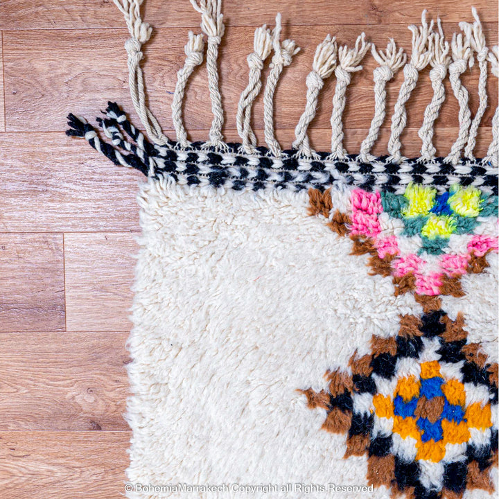 Large Beni Ourain Moroccan rug with colorful diamond motifs on white wool background – handmade Berber shag carpet