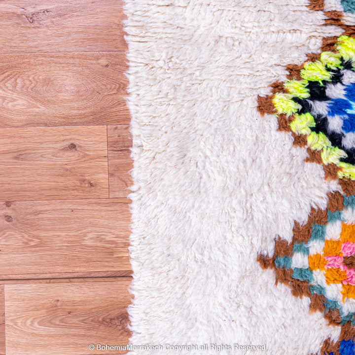 Large Beni Ourain Moroccan rug with colorful diamond motifs on white wool background – handmade Berber shag carpet