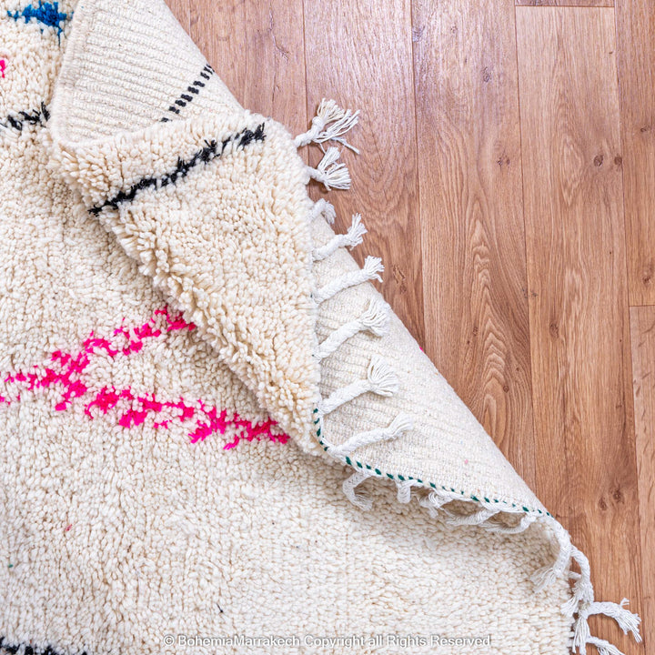 Colorful Beni Ourain rug with checkered tribal patterns on white wool background – handmade Moroccan rug