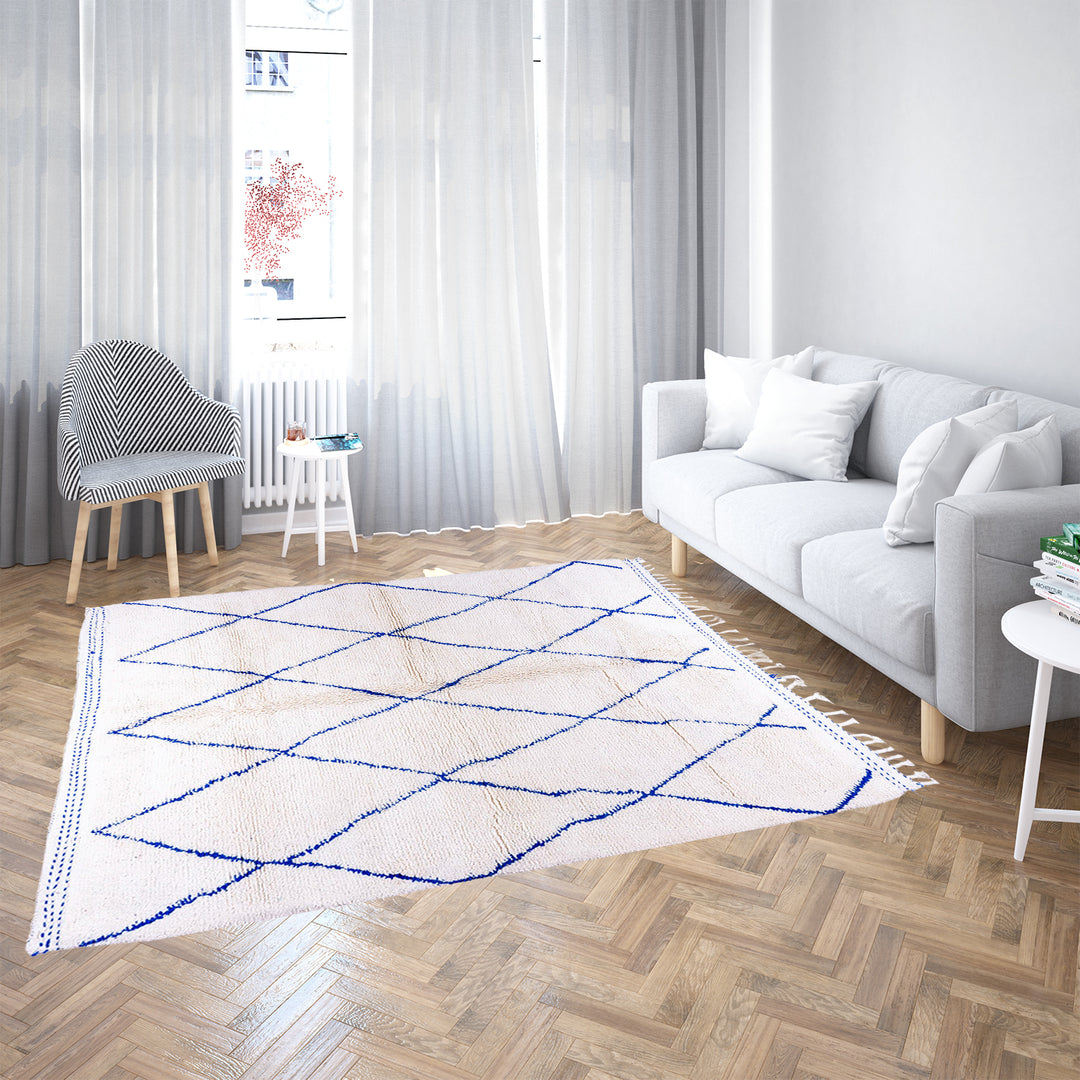 Large Beni Ourain Moroccan wool rug with blue diamond pattern on white background – handmade by Berber artisans
