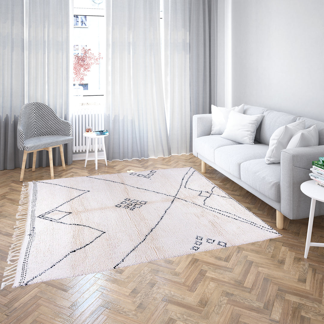 Minimalist Moroccan Beni Ourain rug in black and white wool with hand-knotted tribal motifs
