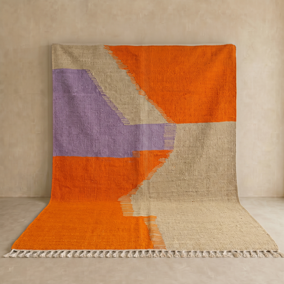Handwoven Moroccan wool rug in light brown, orange, and purple with geometric modern pattern – natural flatweave Berber carpet