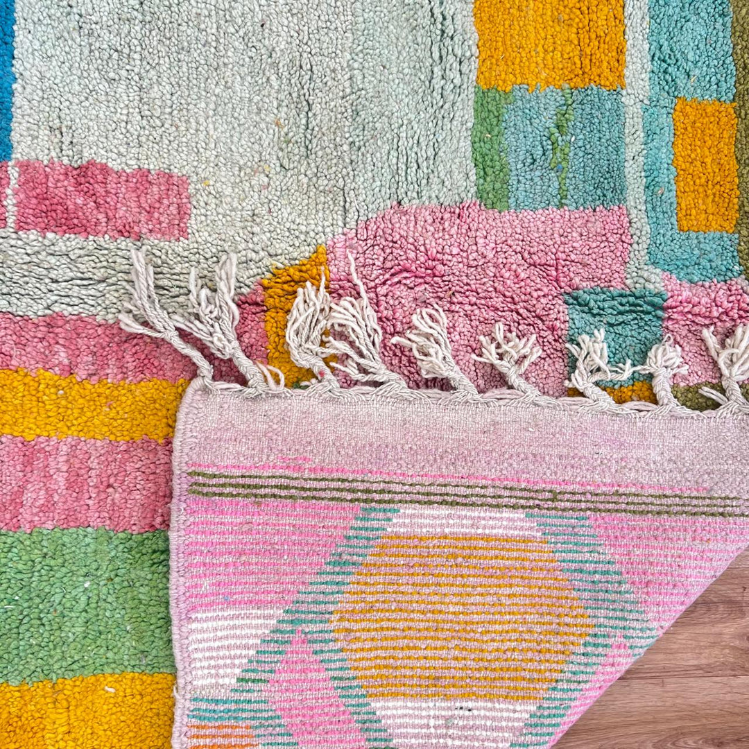 Vintage Moroccan wool rug 835 – handmade colorful abstract Berber carpet in pink, yellow, and blue (279 × 206 cm / 9.15 × 6.75 ft).