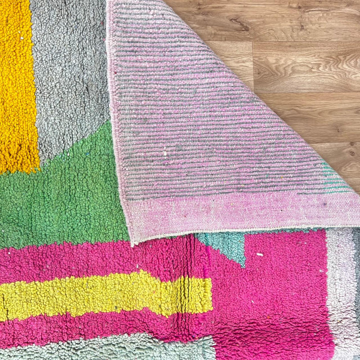Vintage Moroccan wool rug 835 – handmade colorful abstract Berber carpet in pink, yellow, and blue (279 × 206 cm / 9.15 × 6.75 ft).