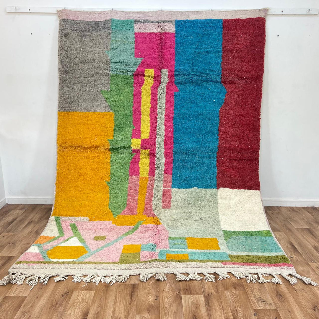 Vintage Moroccan wool rug 835 – handmade colorful abstract Berber carpet in pink, yellow, and blue (279 × 206 cm / 9.15 × 6.75 ft).