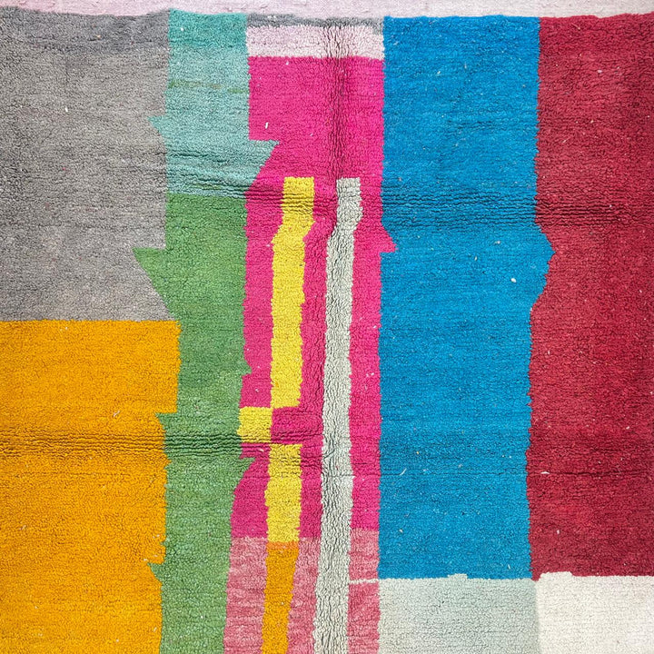 Vintage Moroccan wool rug 835 – handmade colorful abstract Berber carpet in pink, yellow, and blue (279 × 206 cm / 9.15 × 6.75 ft).