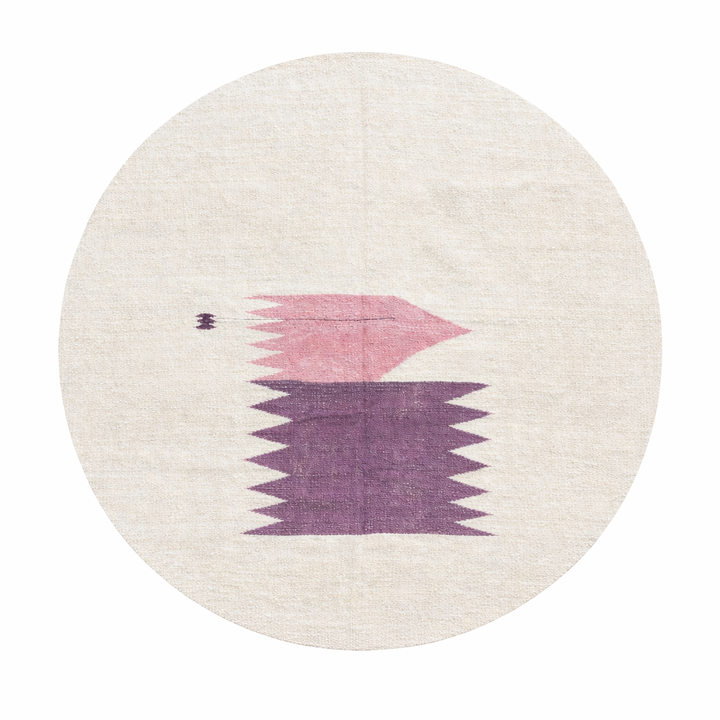 Flat weave round Moroccan wool rug with minimalist abstract pink and purple design on white background