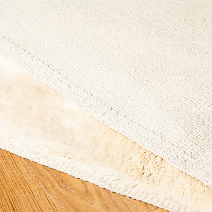 Minimalist Ivory Moroccan Rug in Subtle Tone-on-Tone Design
