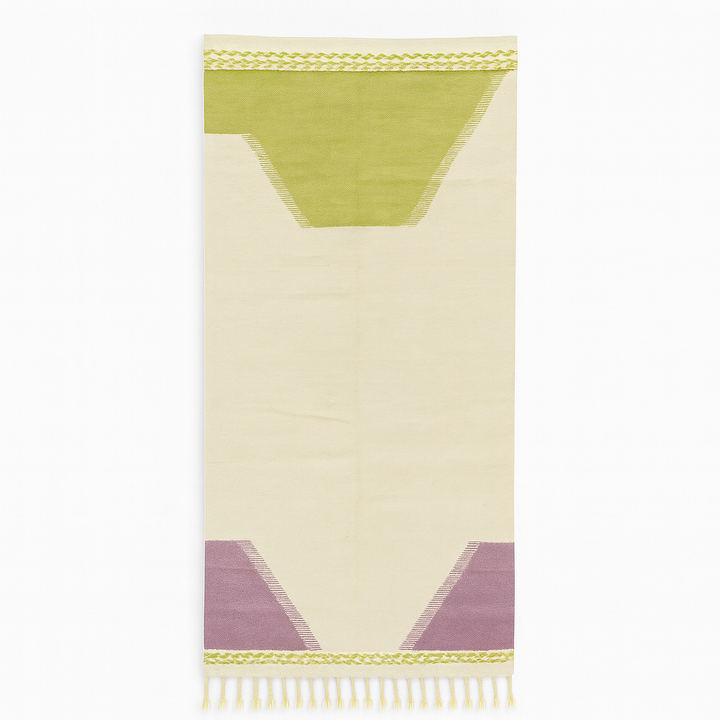 Handmade Moroccan kilim runner rug with green and purple geometric design on white background, flatwoven minimalist Moroccan corridor rug